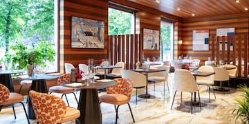 a room with tables and chairs