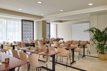 a room with tables and chairs