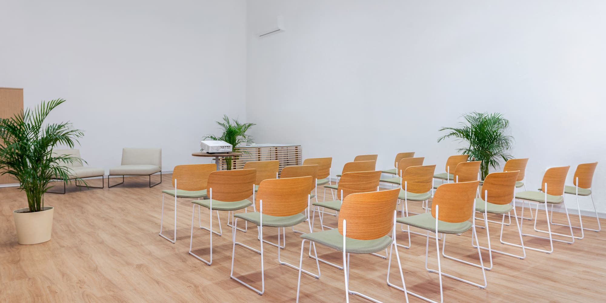 a room with chairs and a table
