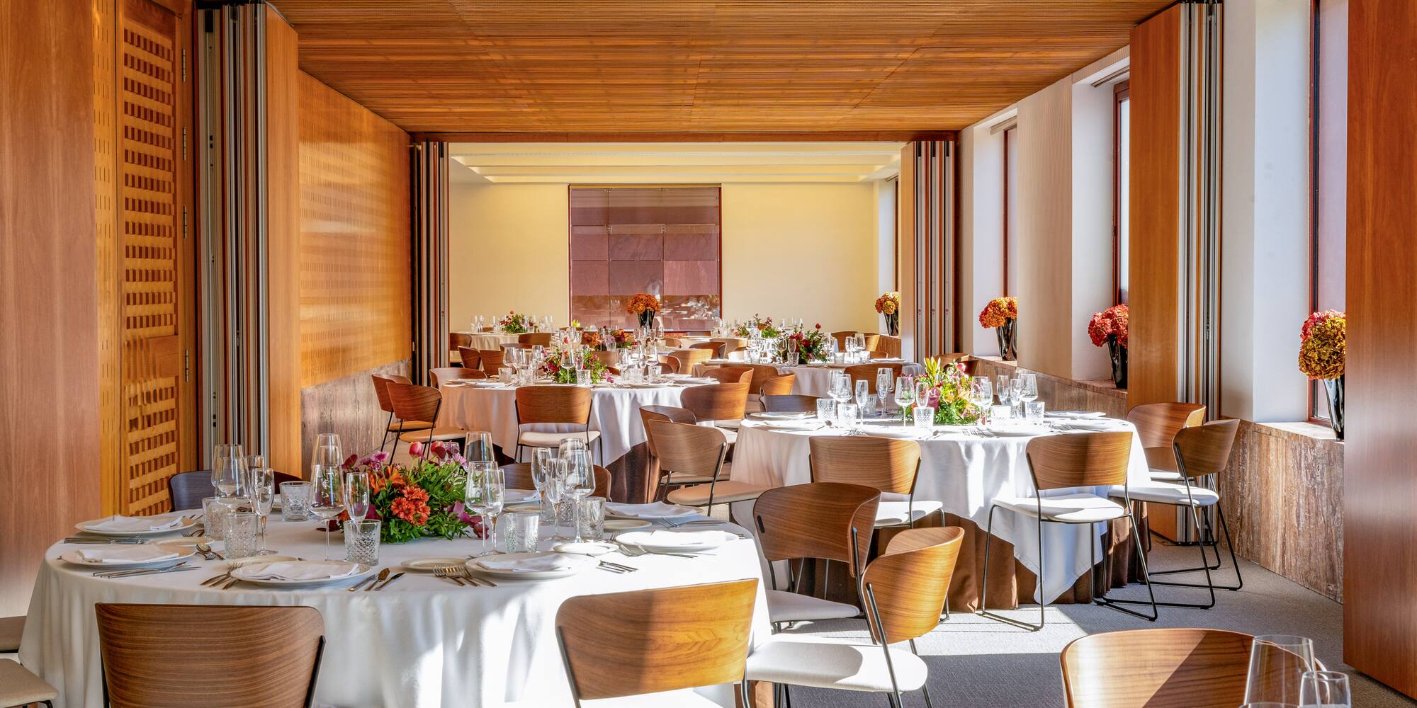 a room with tables and chairs