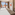 Resort hotel room with twin beds, private balcony, and ocean view.