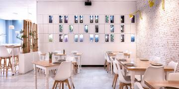 a room with tables and chairs