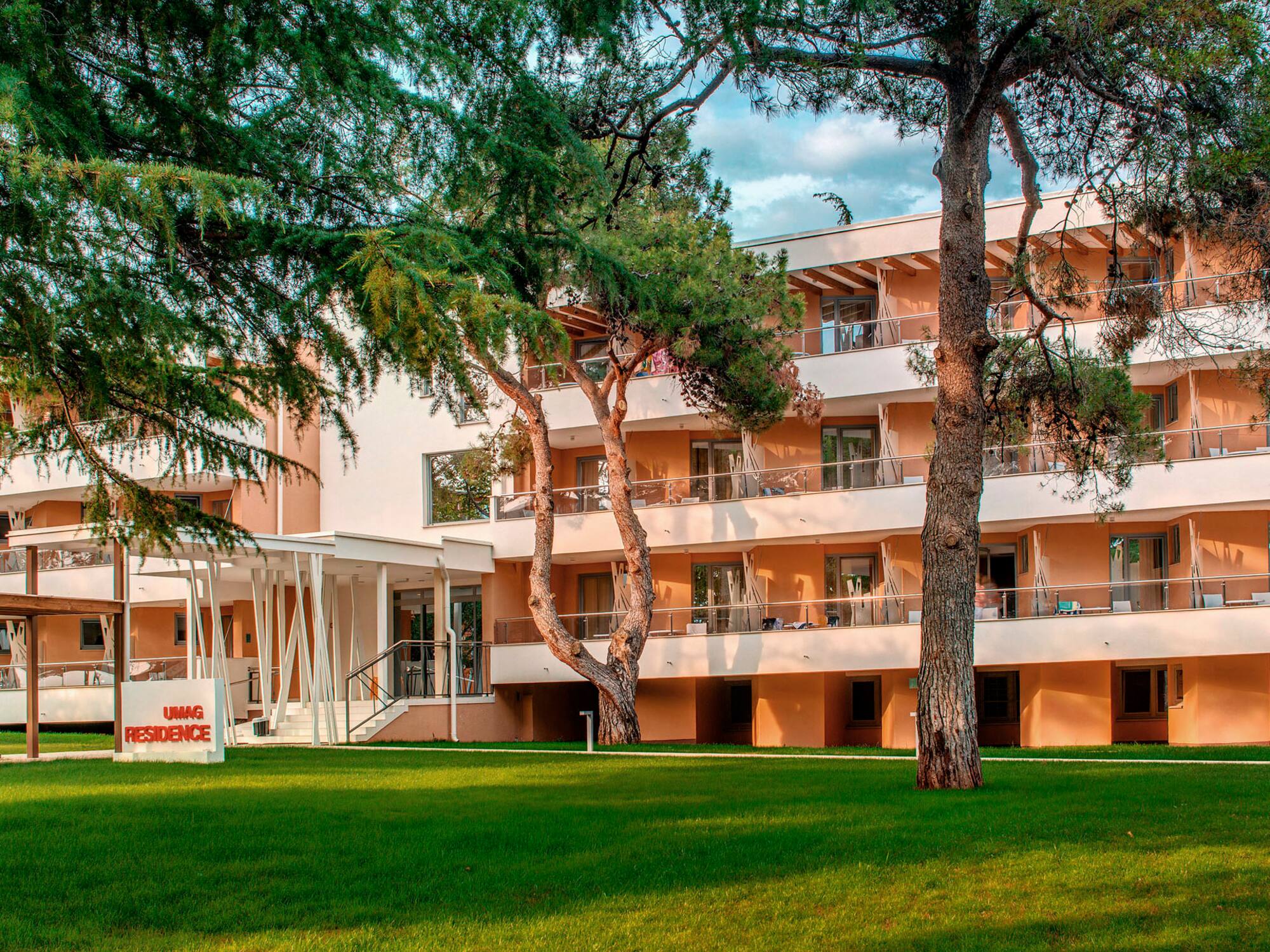 a building with trees in front of it