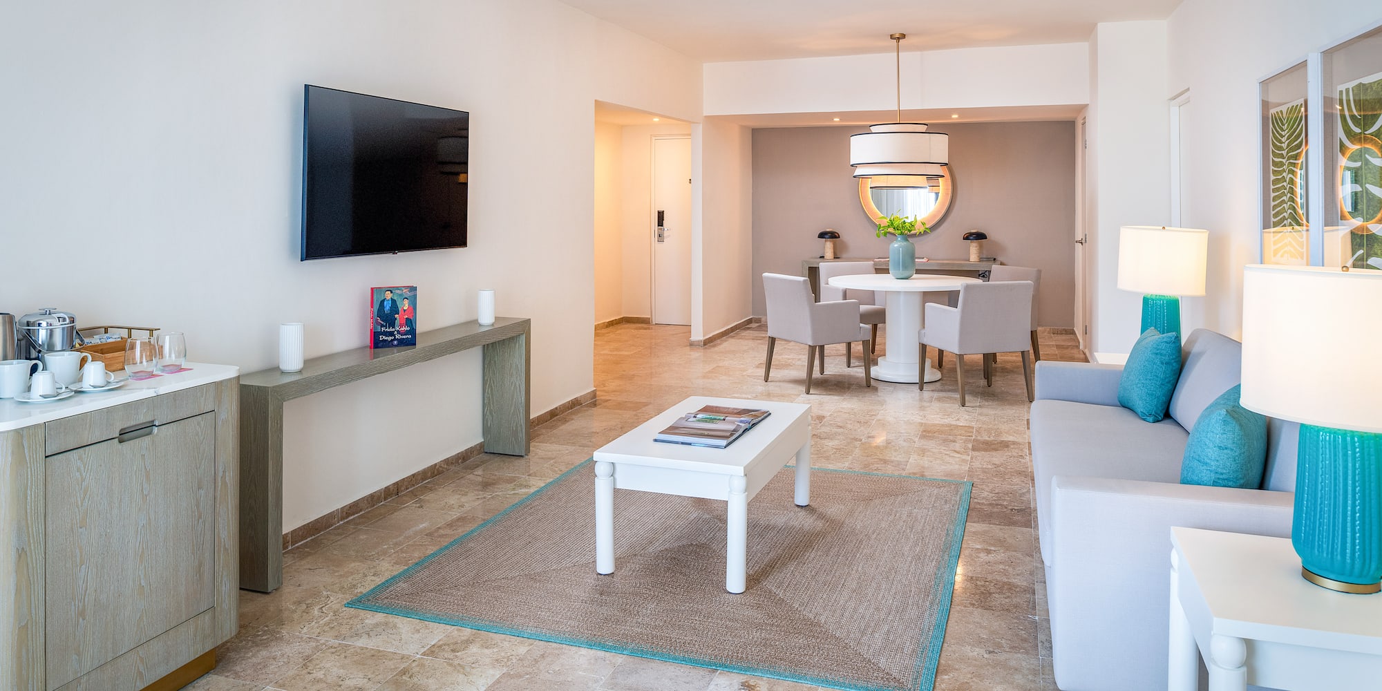 a living room with a tv and a table