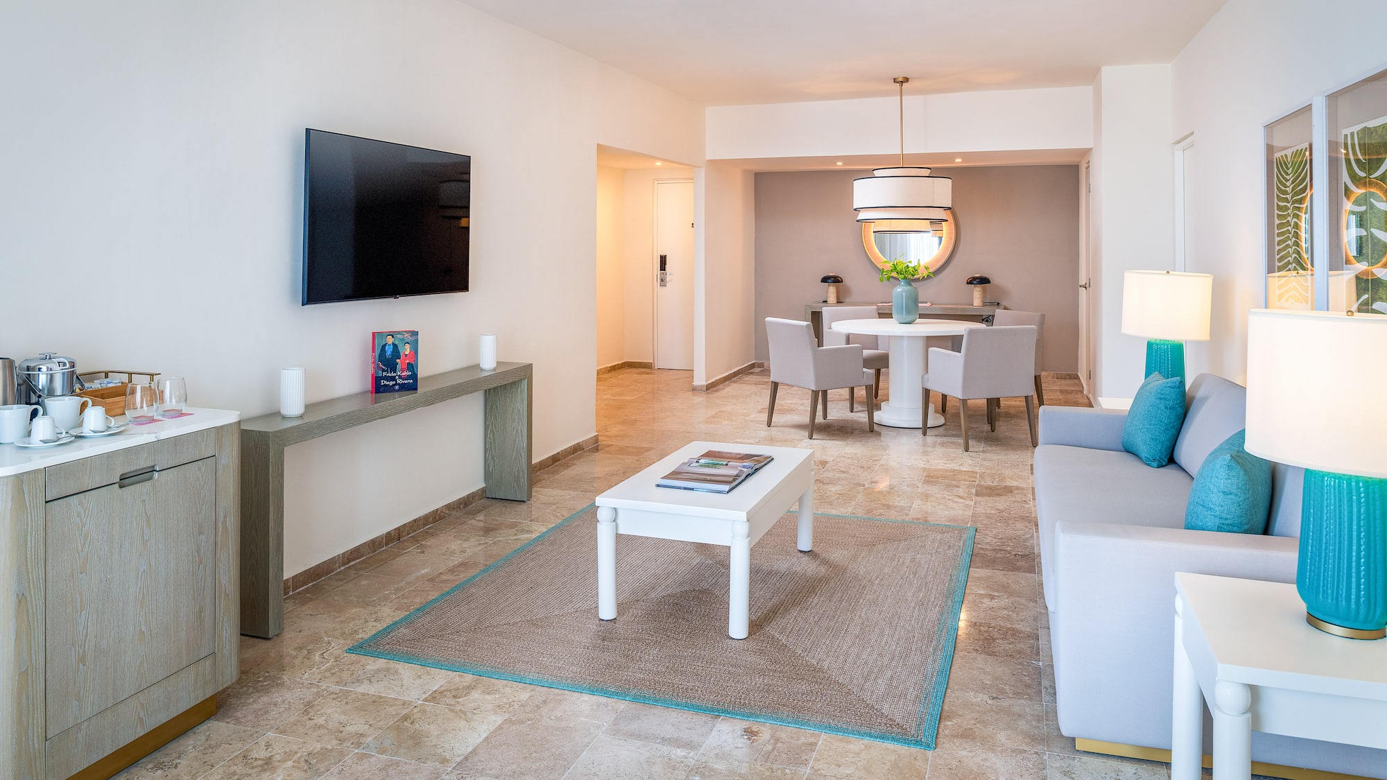 a living room with a tv and a table