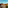 Andalusian white village nestled in sunlit mountains at golden hour.