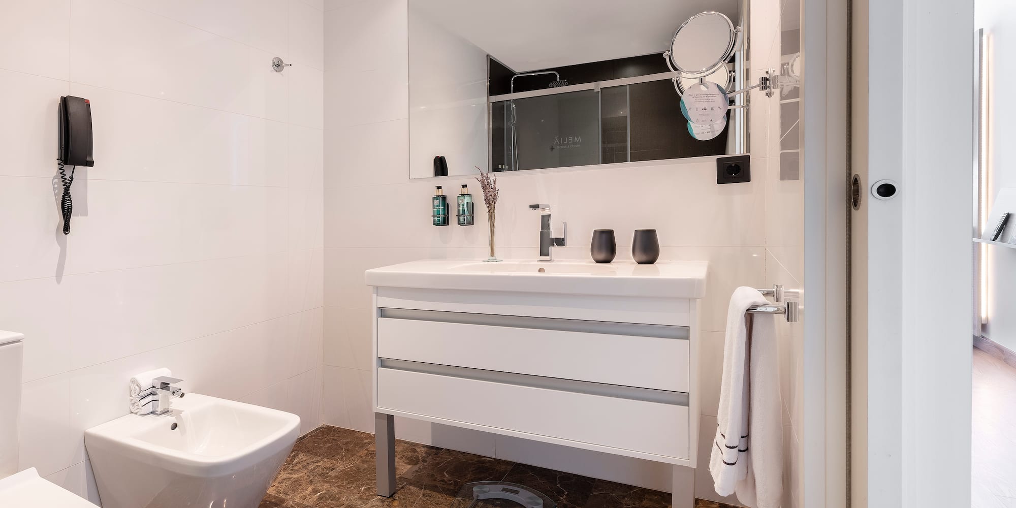 a bathroom with a sink and a toilet