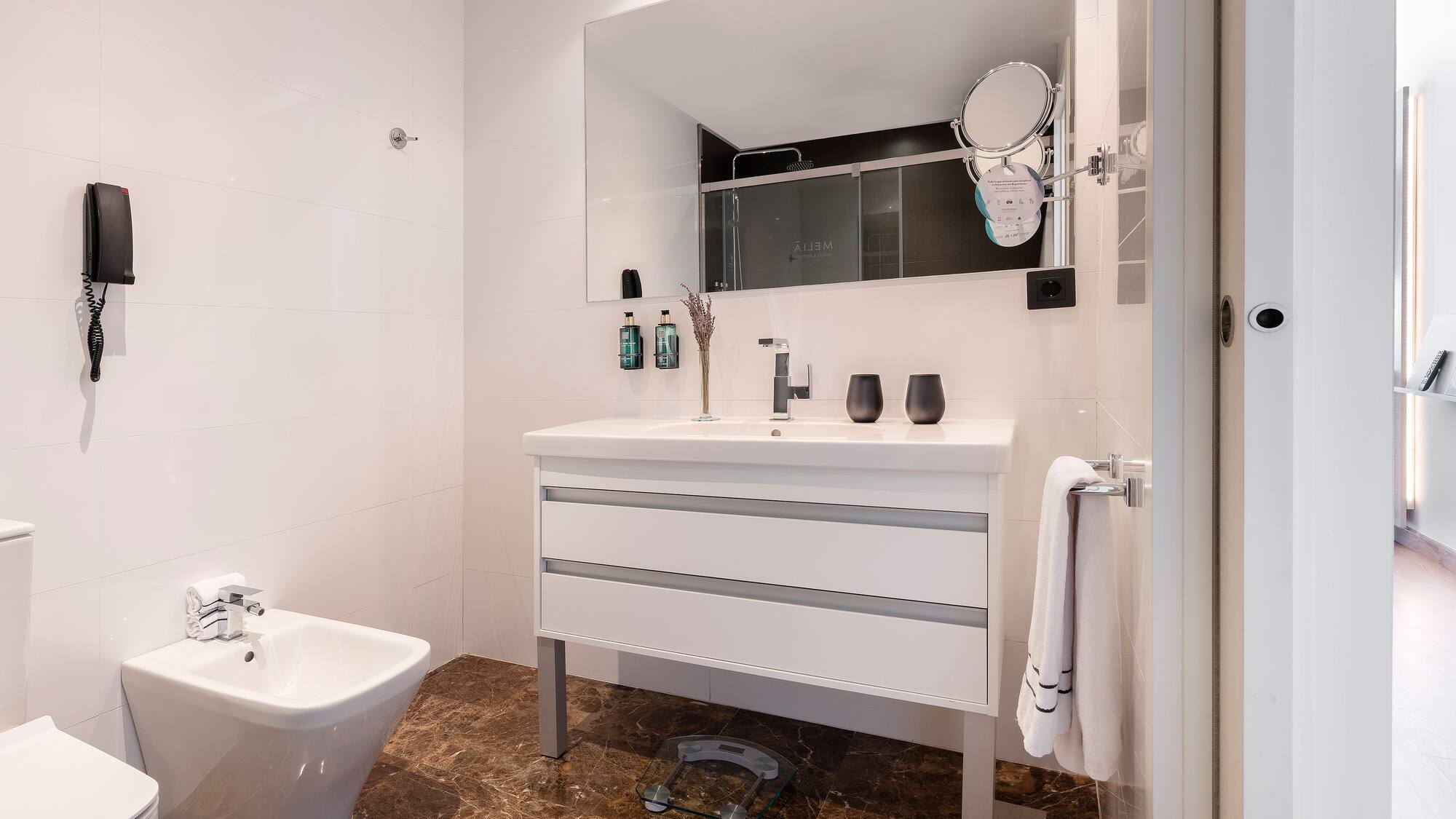 a bathroom with a sink and a toilet