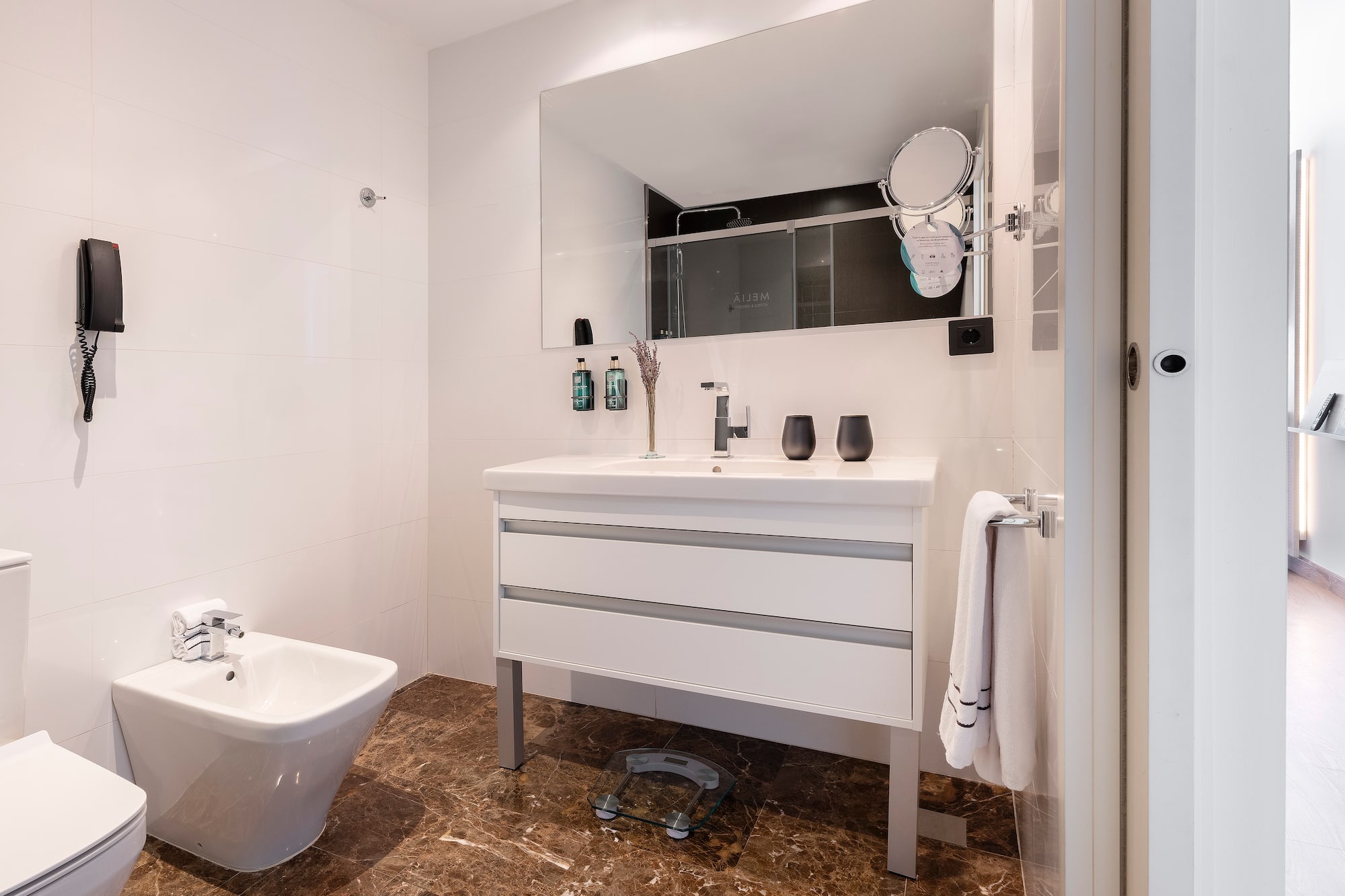 a bathroom with a sink and a toilet