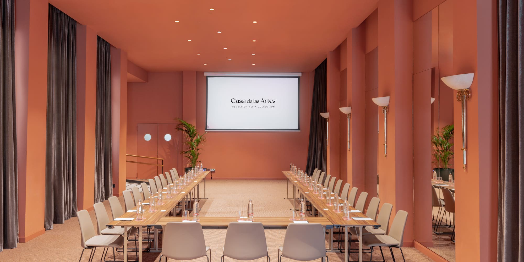 a room with a table and chairs