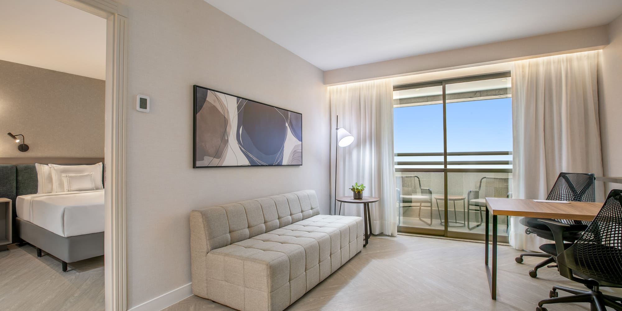 a room with a couch and a table