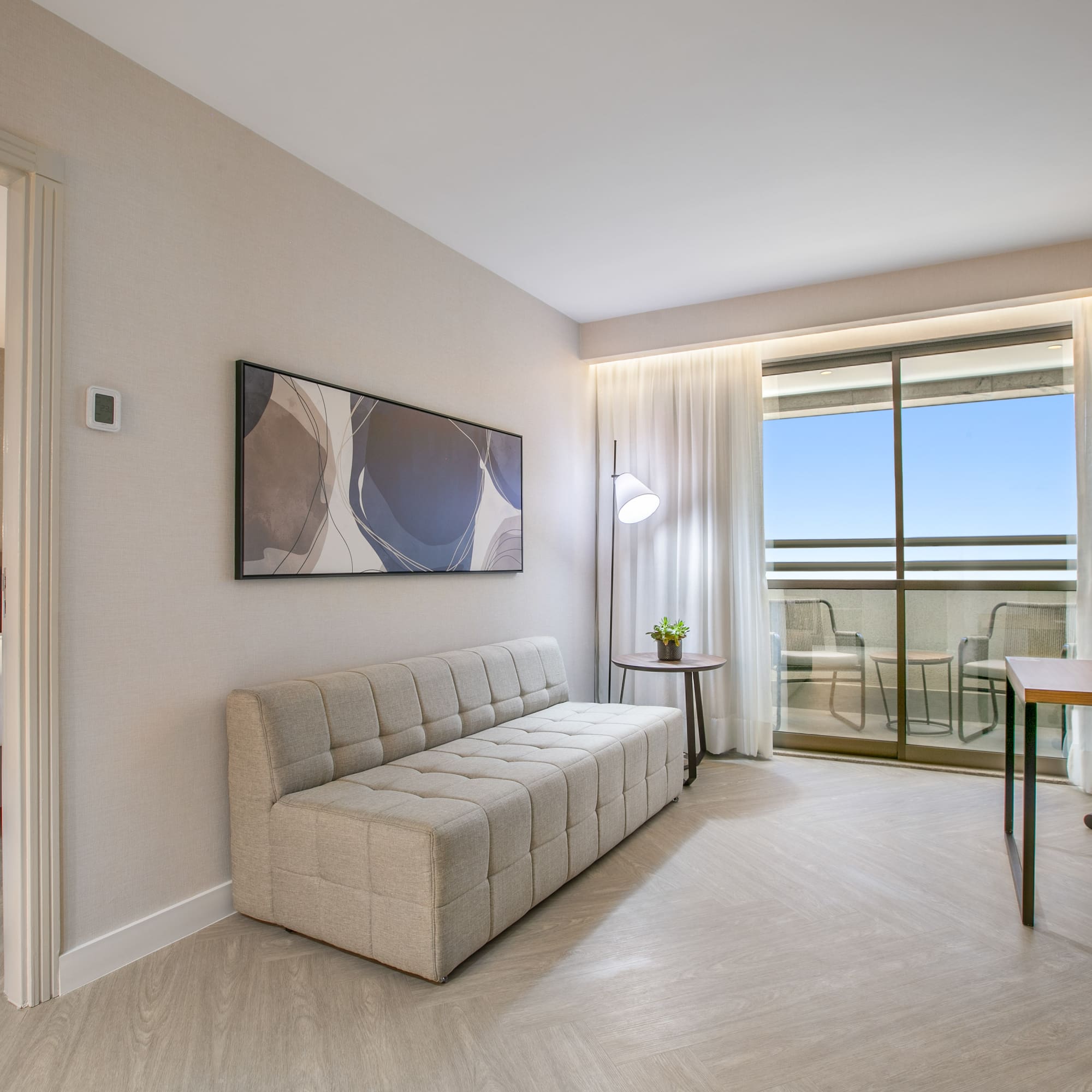 a room with a couch and a table