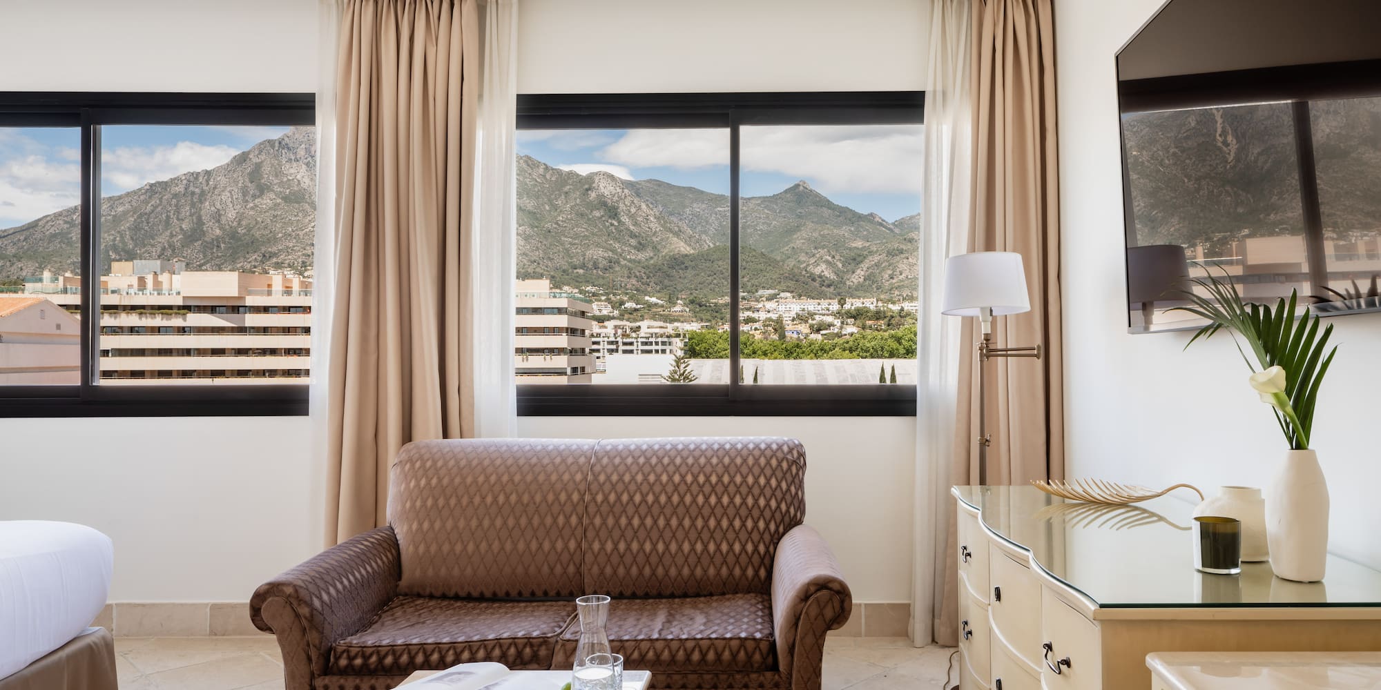a living room with a couch and a television