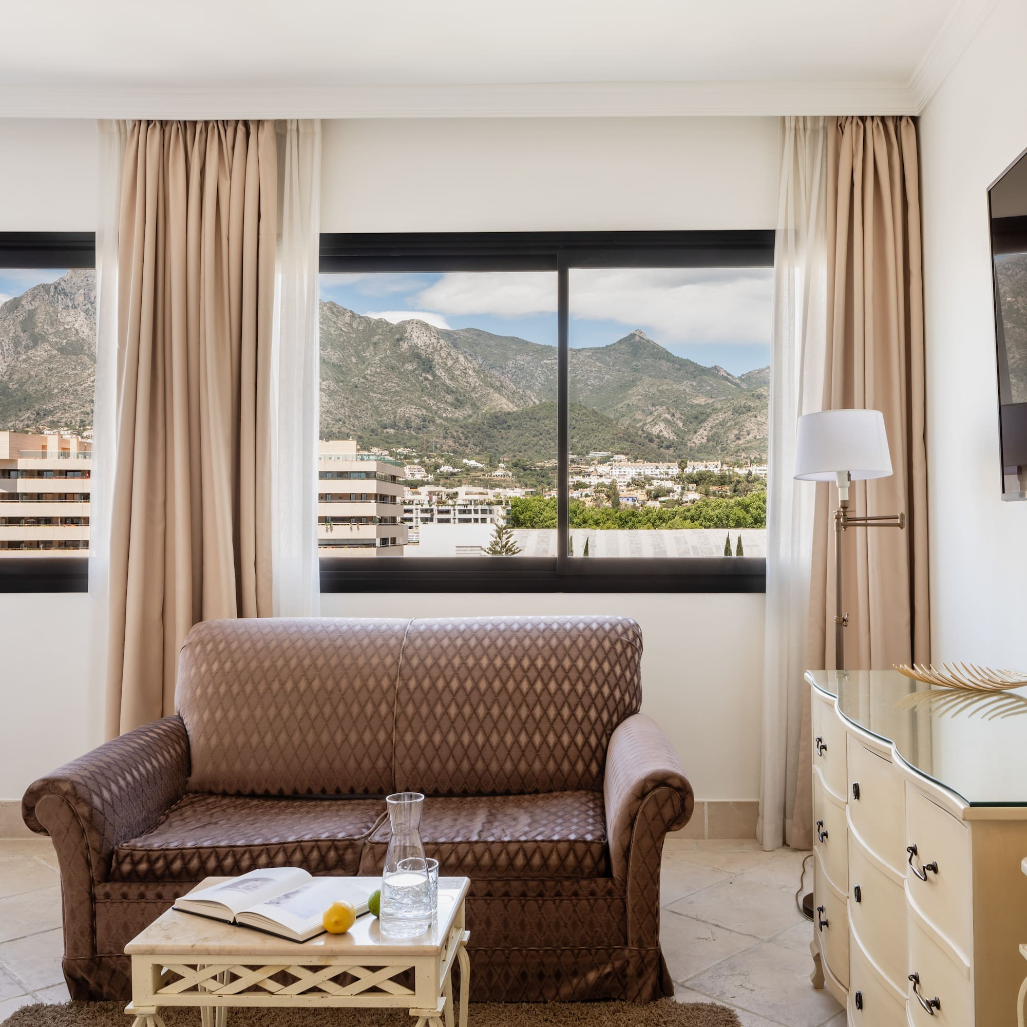 a living room with a couch and a television