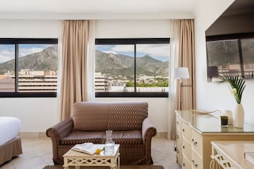 a living room with a couch and a television