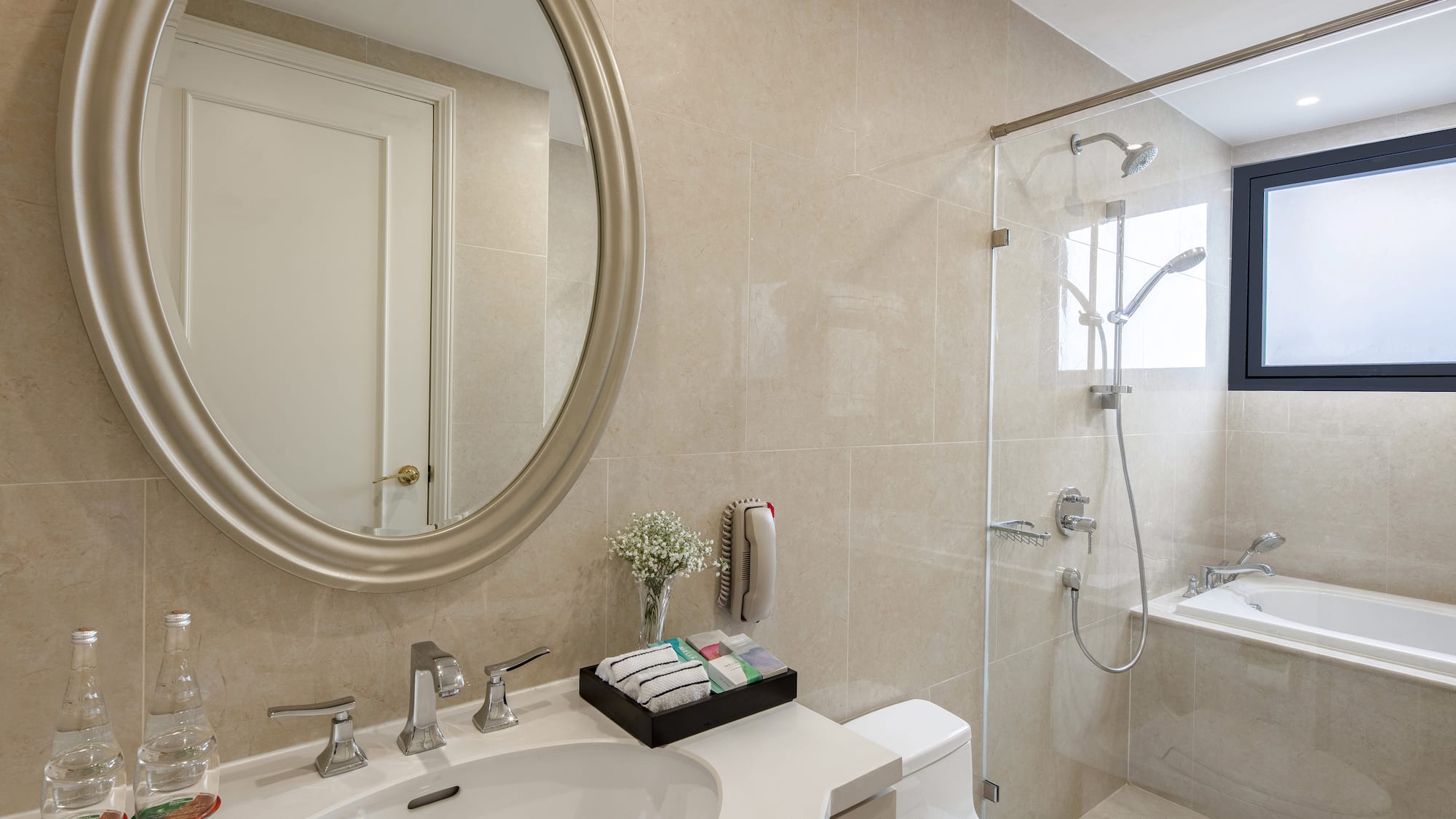 a bathroom with a mirror and a shower