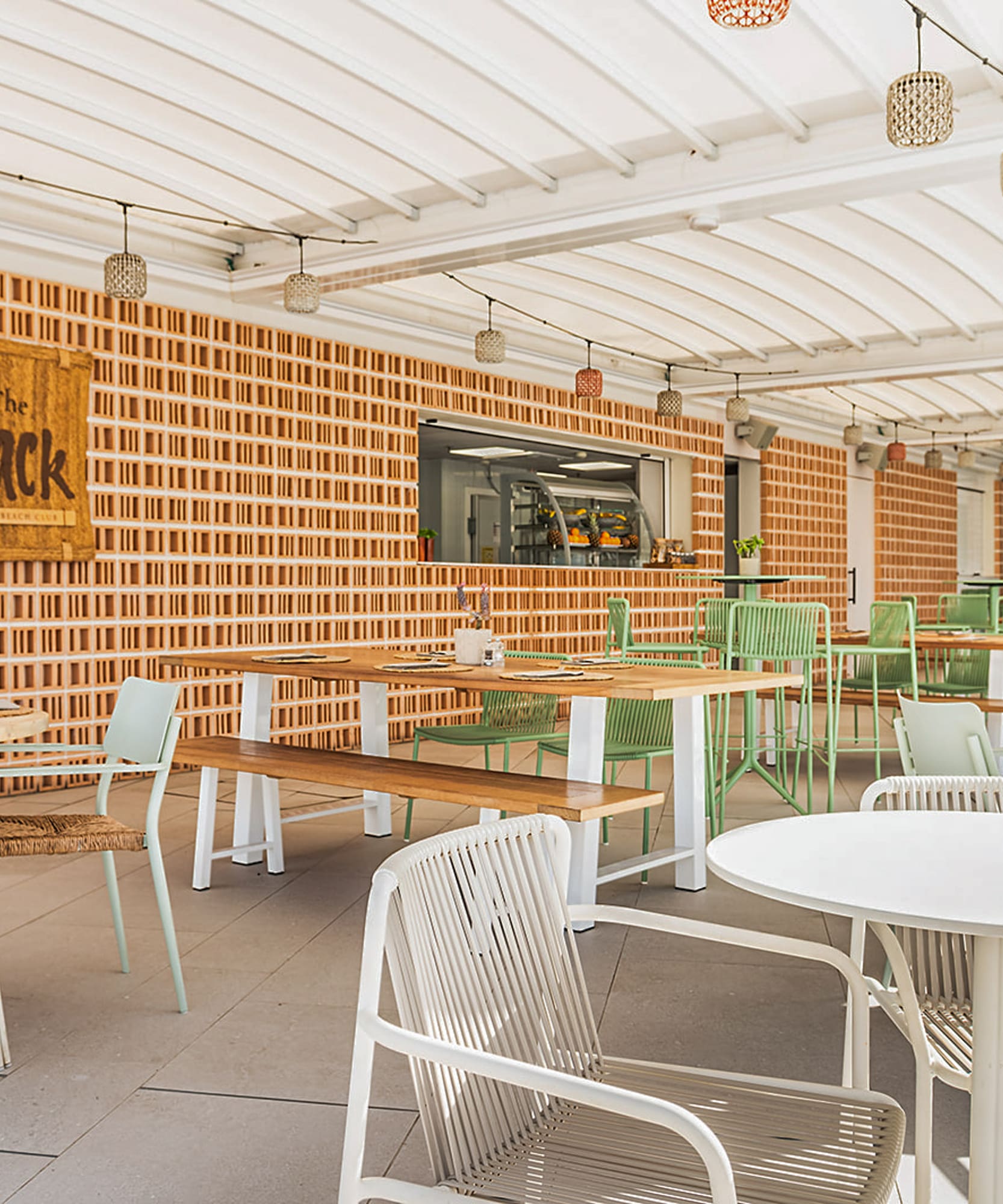 a restaurant with tables and chairs
