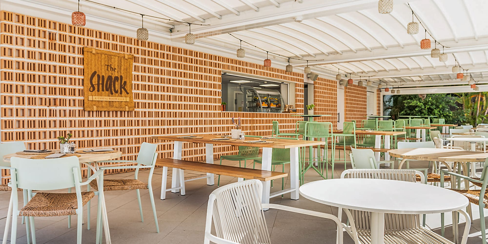 a restaurant with tables and chairs