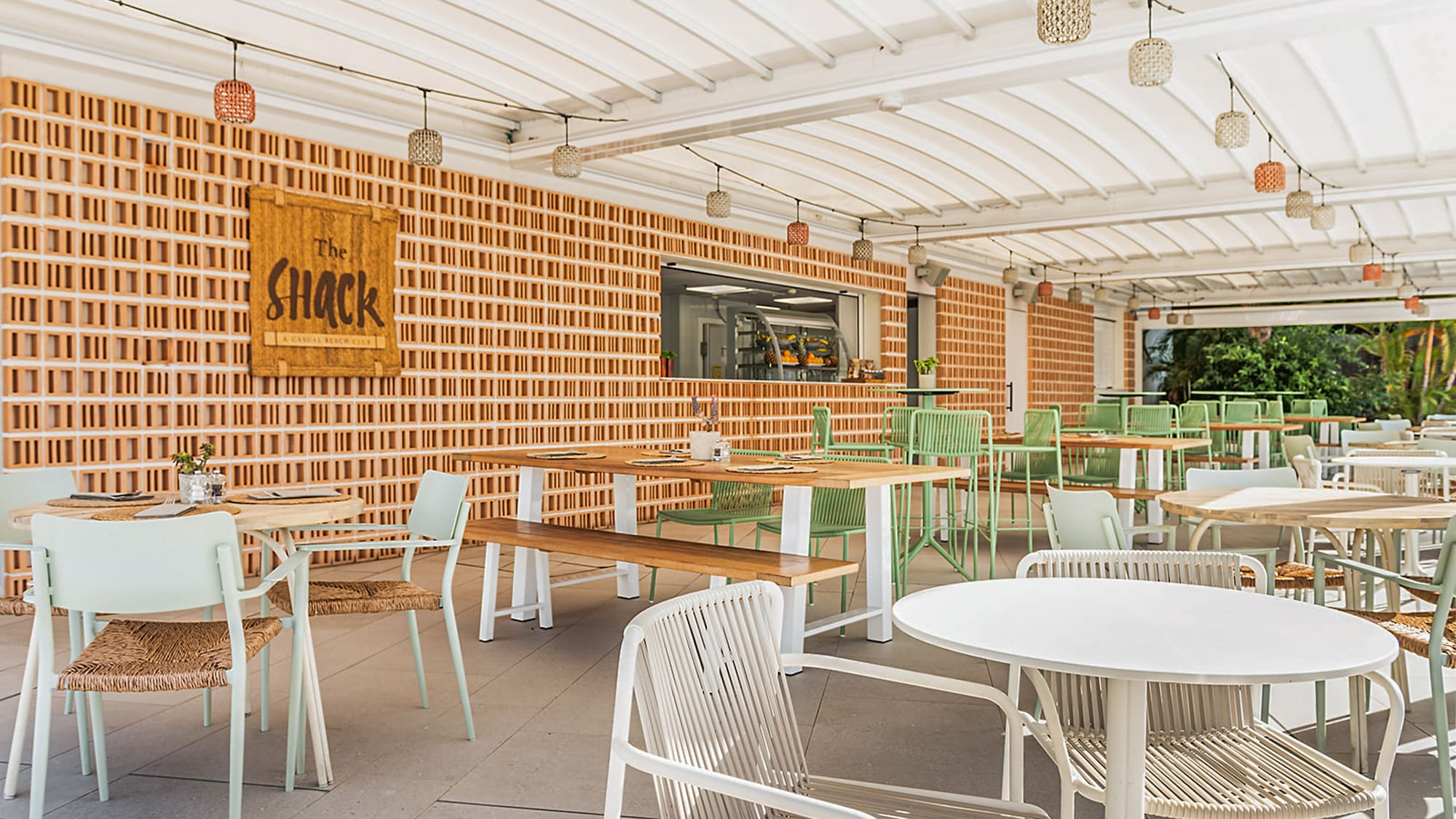 a restaurant with tables and chairs