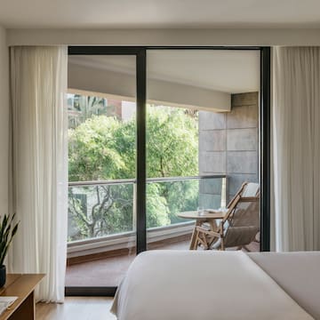 a bedroom with sliding glass doors