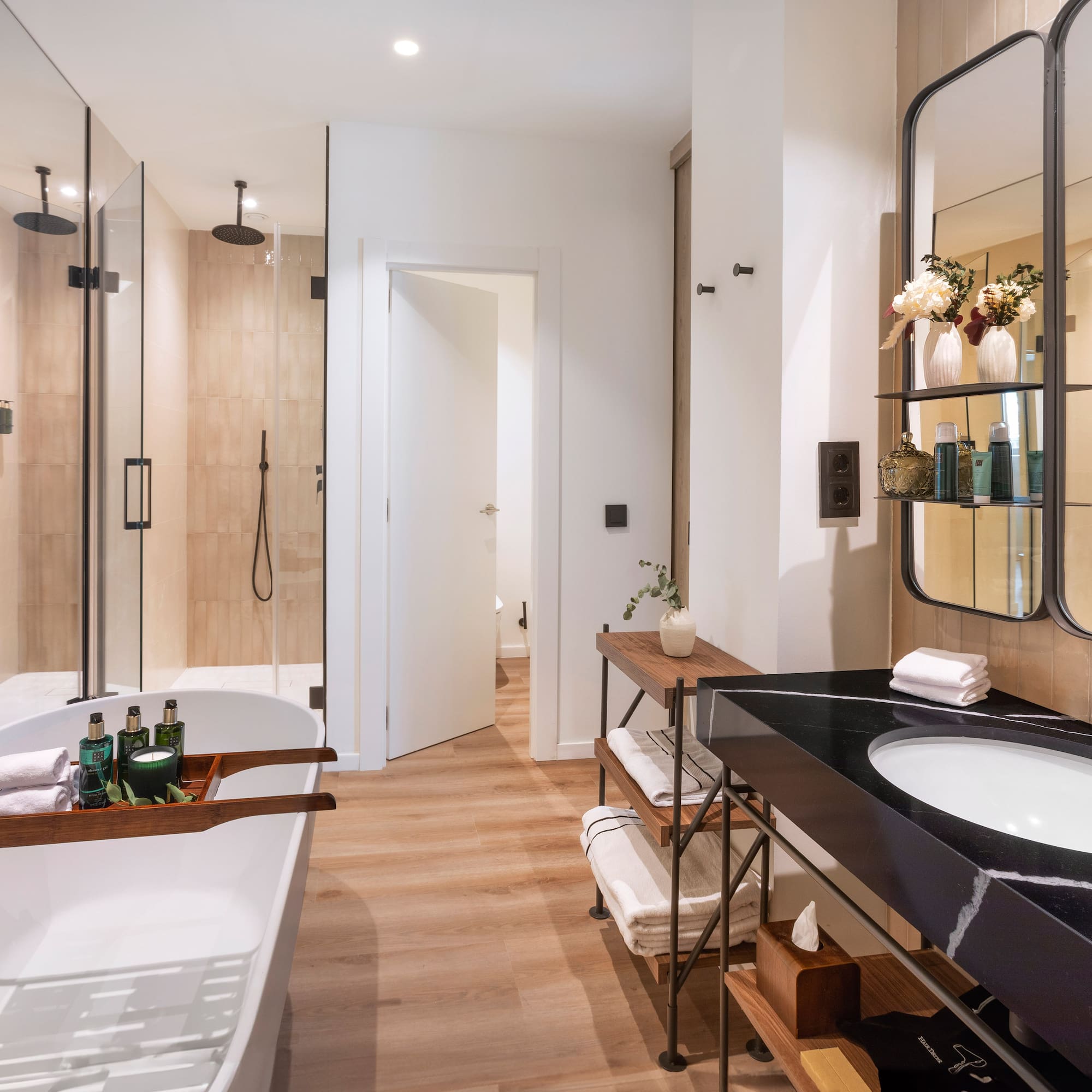 a bathroom with a tub and a sink