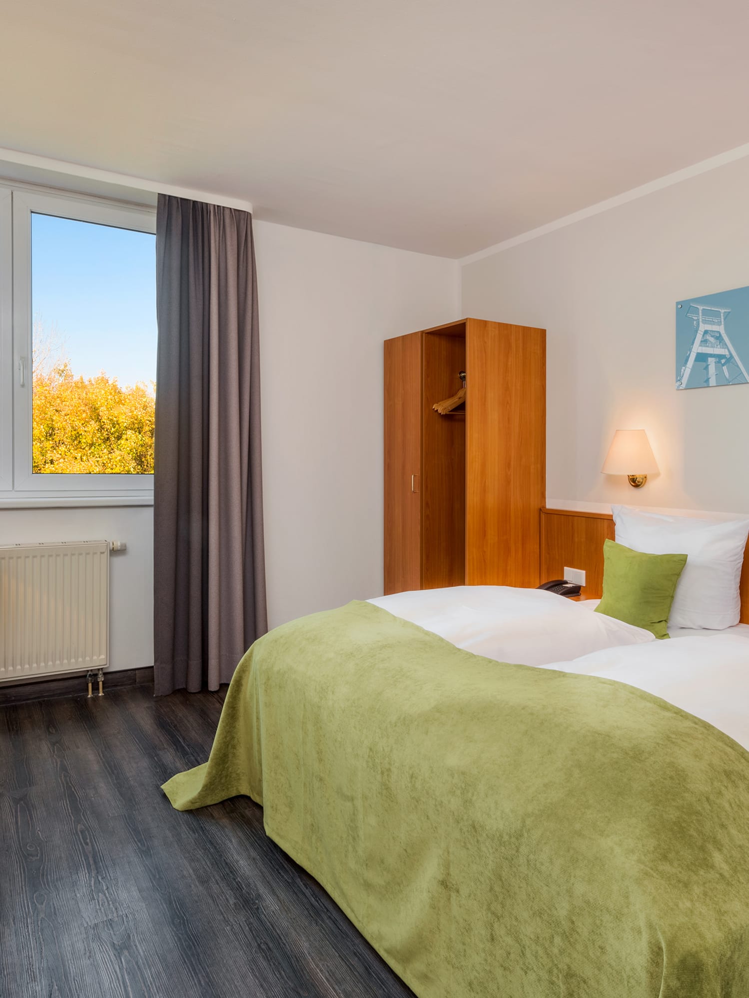 a room with a bed and a desk