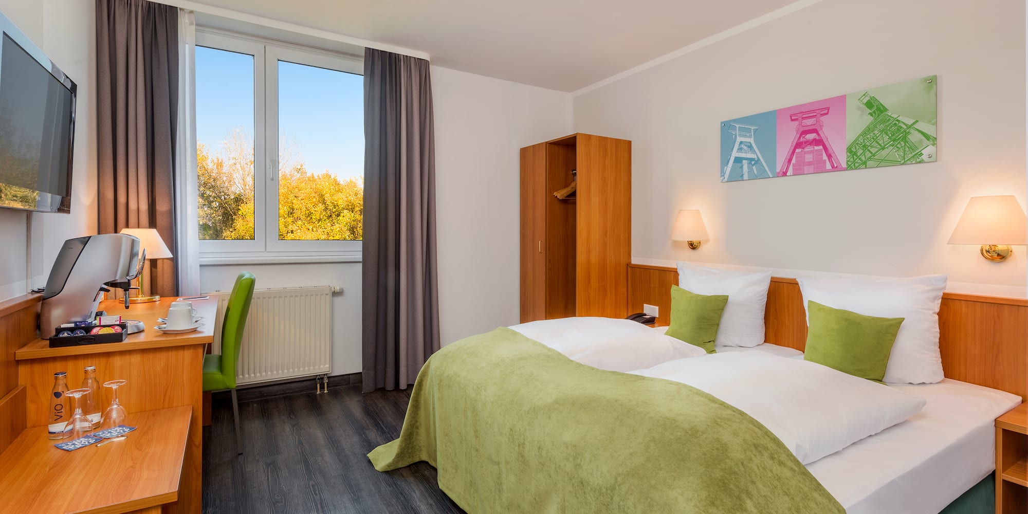 a room with a bed and a desk