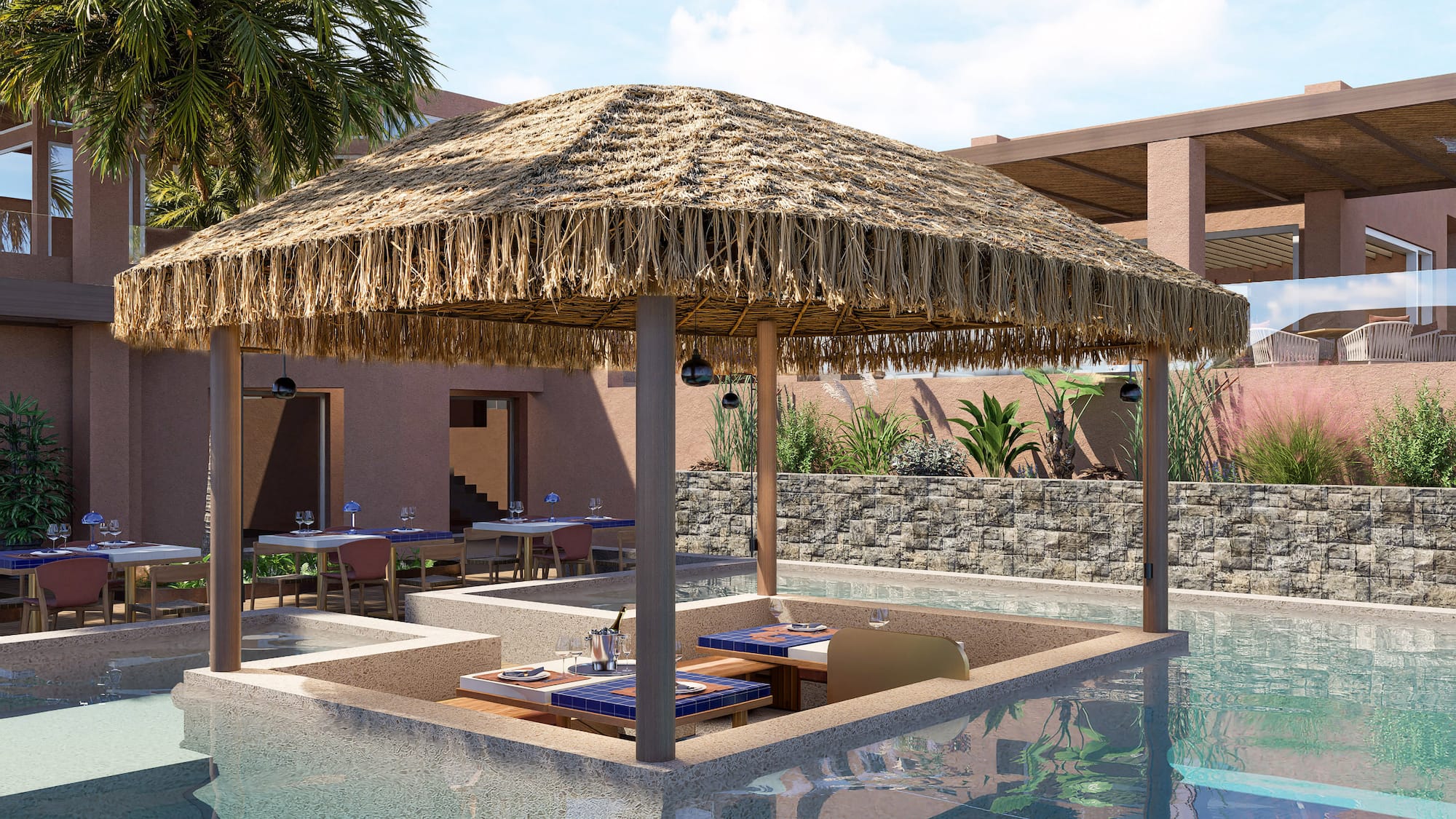 a pool with a thatched roof and tables and chairs