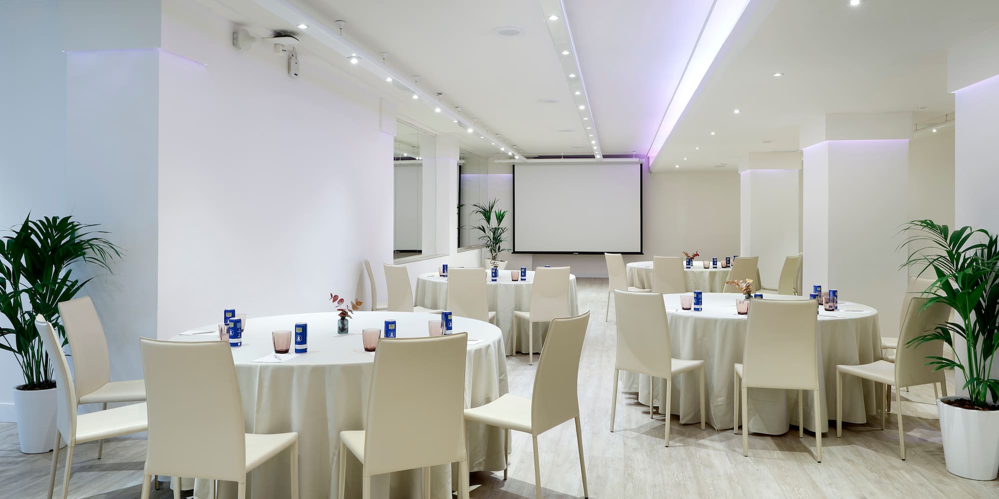 a room with tables and chairs