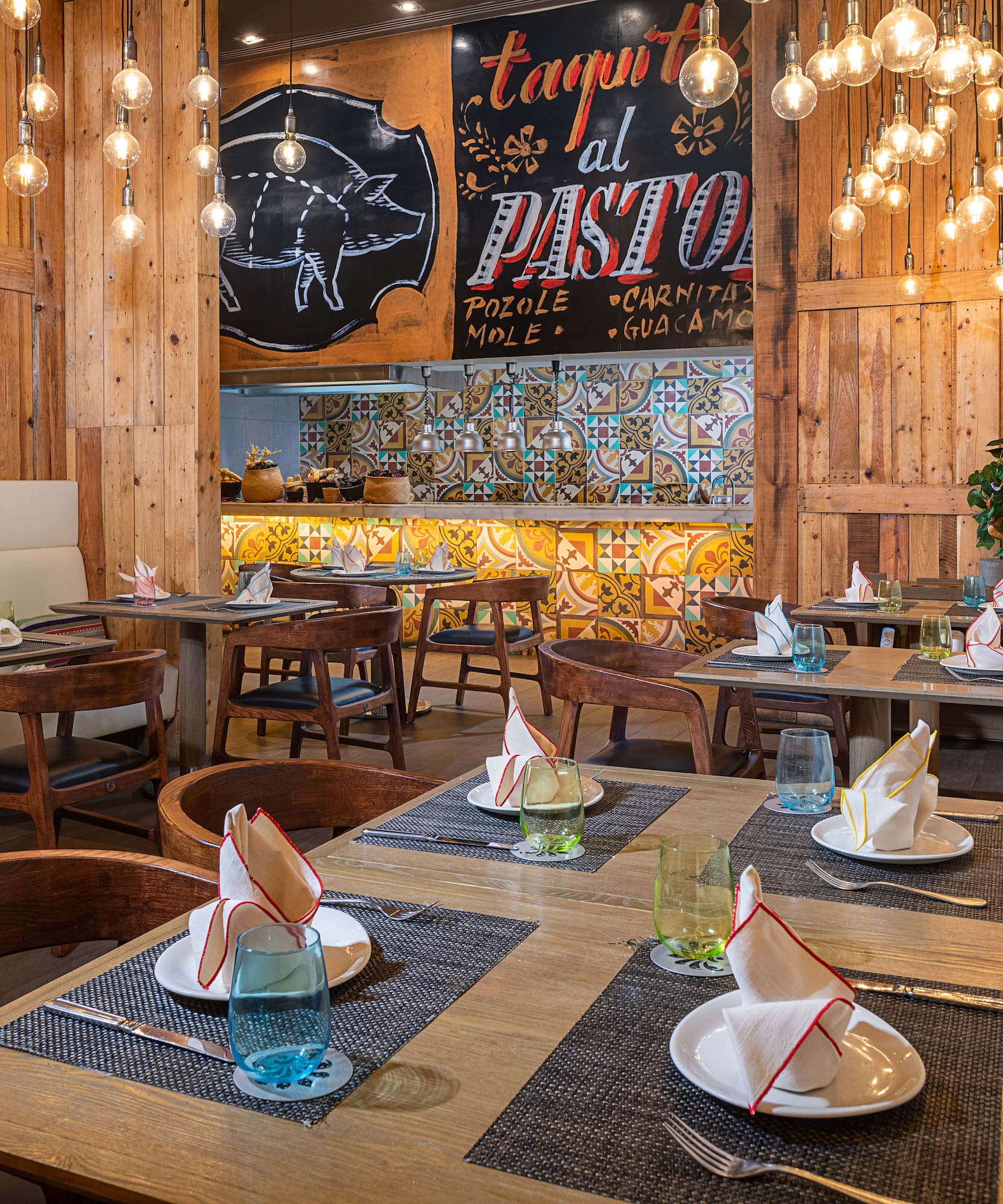 a restaurant with tables and chairs