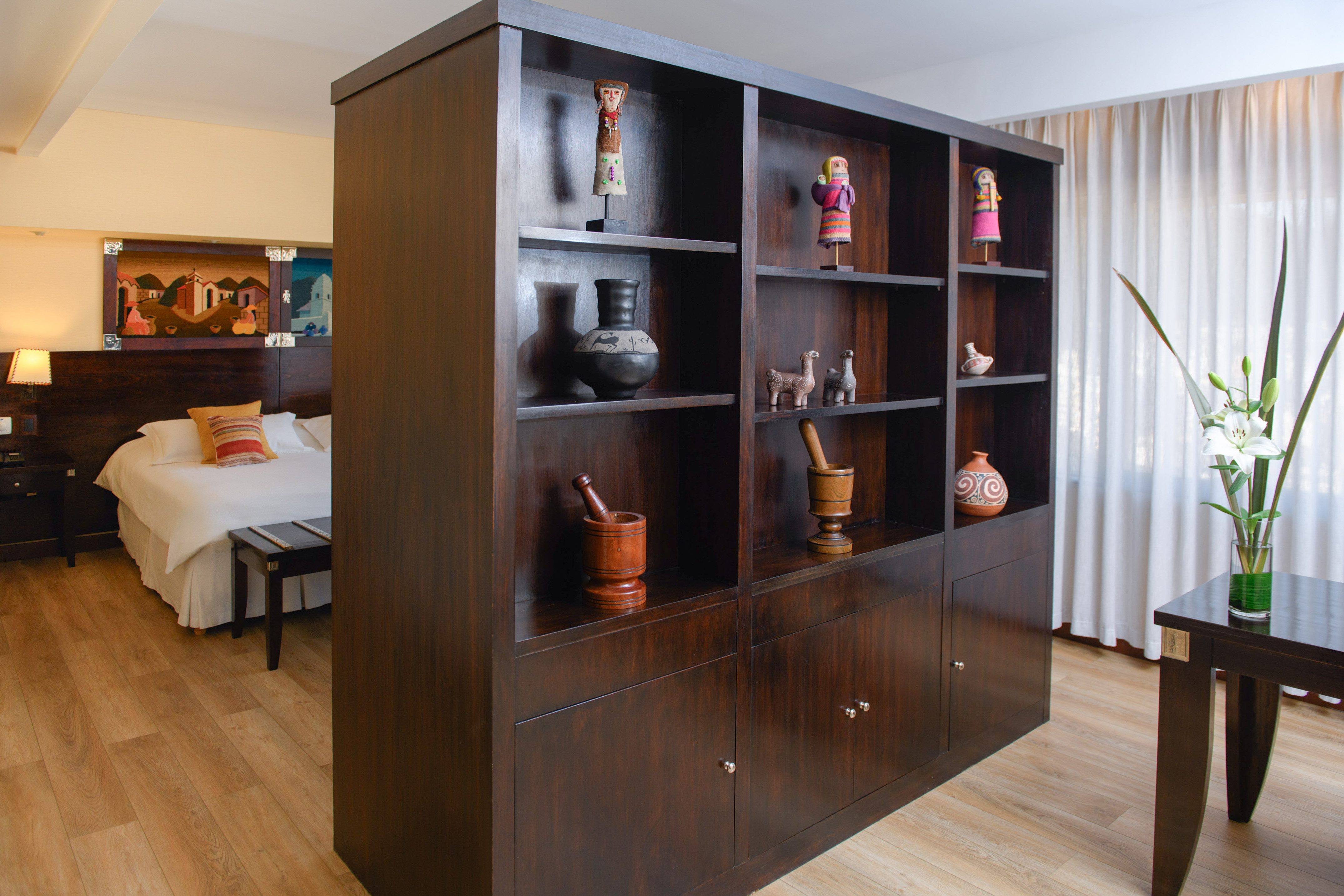 a large wooden shelf with objects on it
