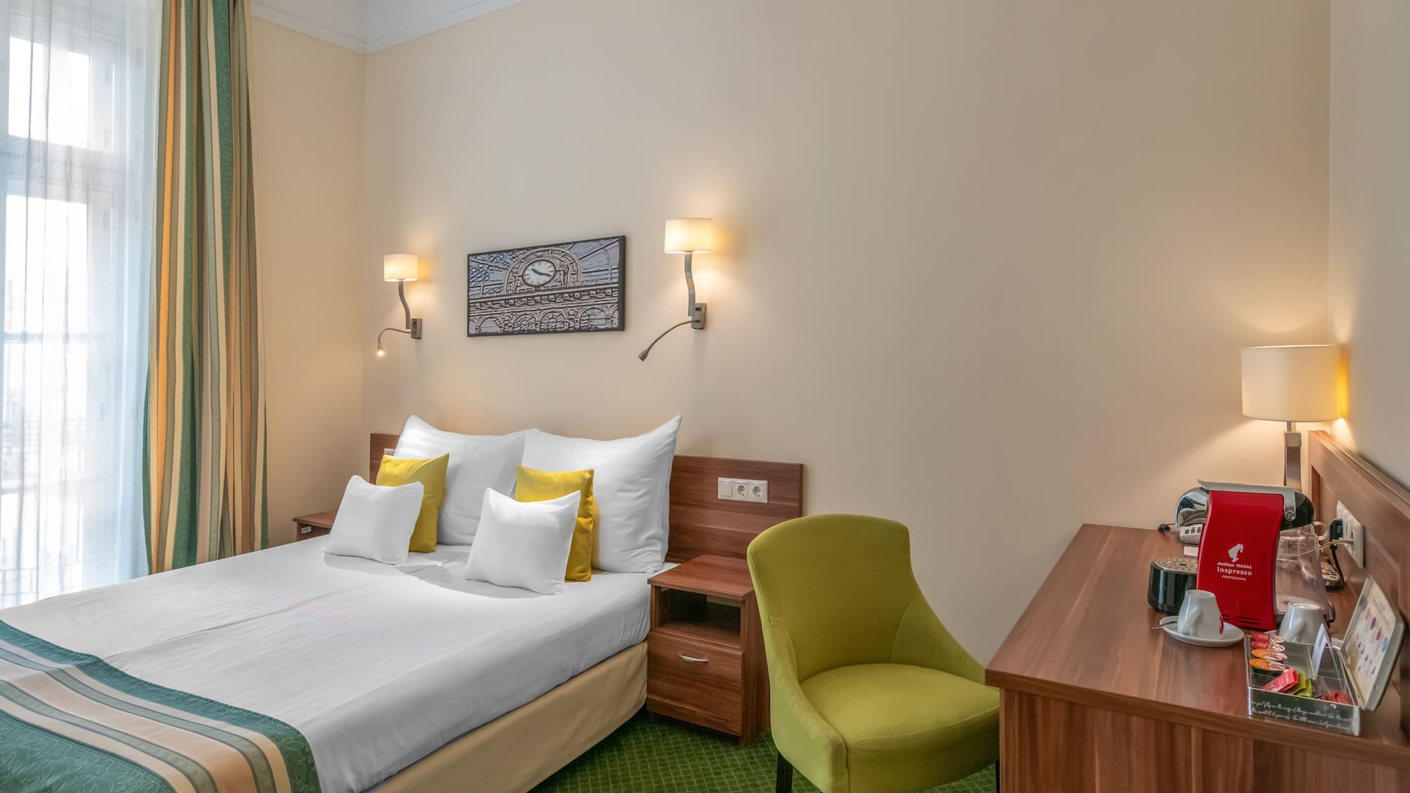 a room with a bed and a desk