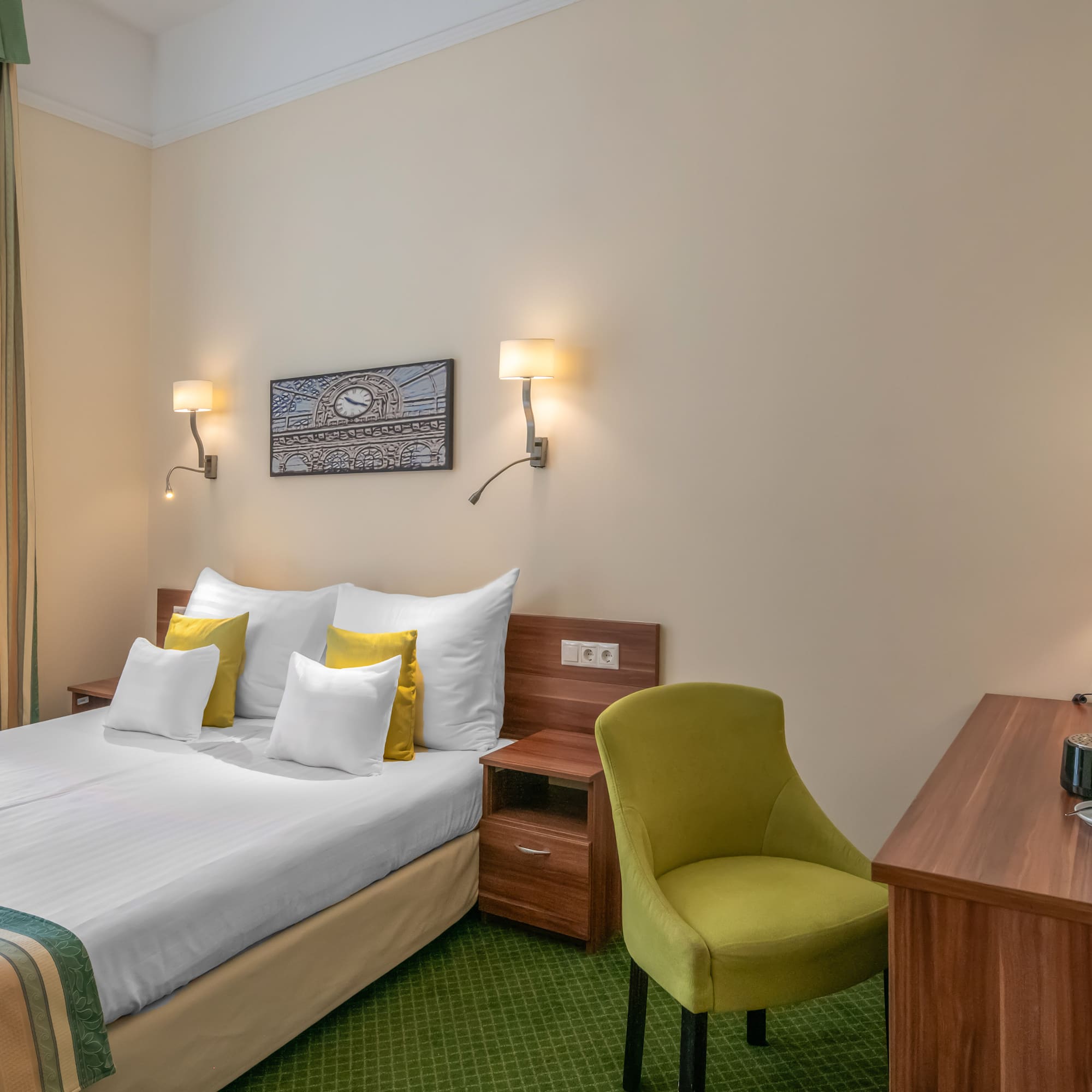 a room with a bed and a desk