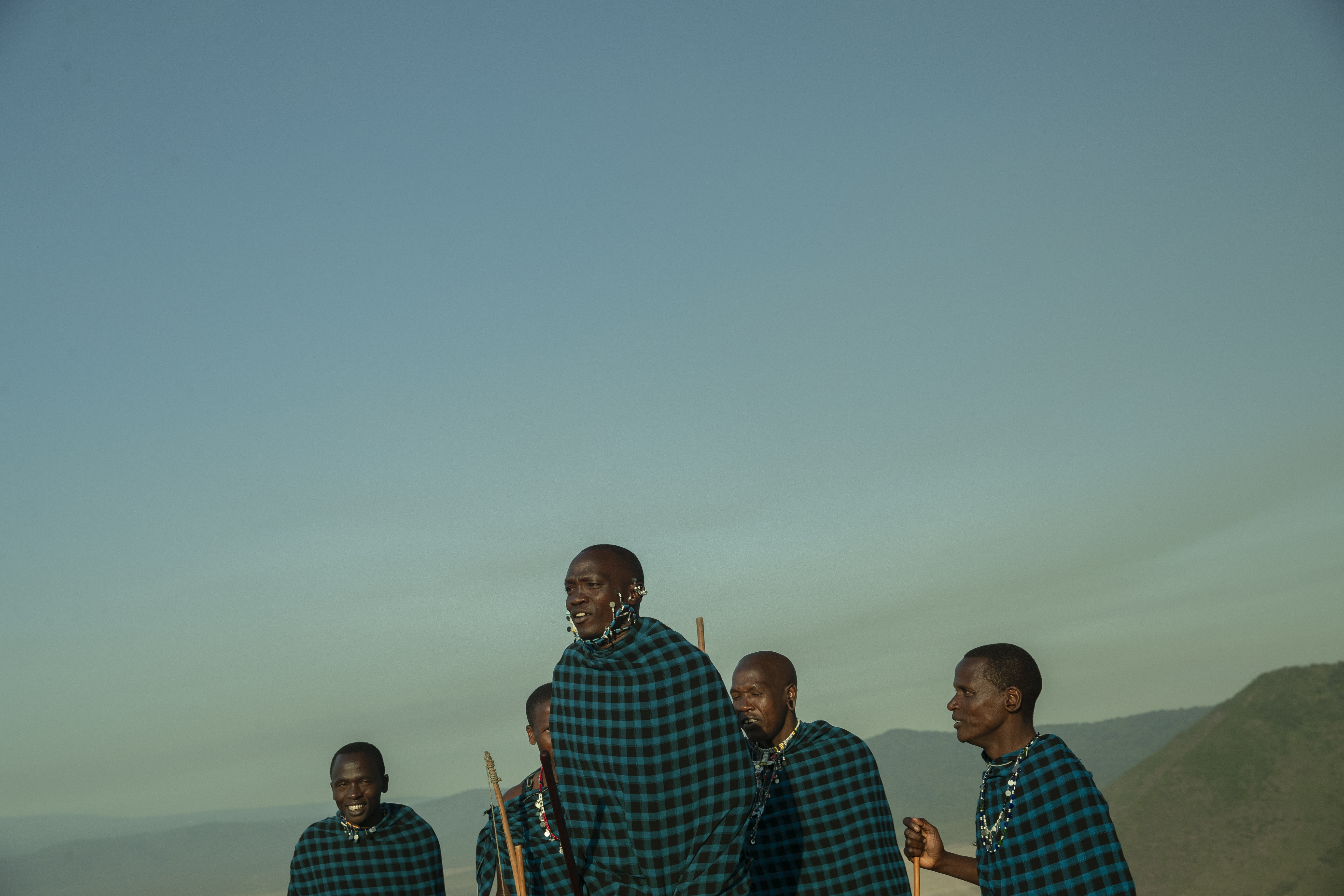 a group of men wearing matching outfits