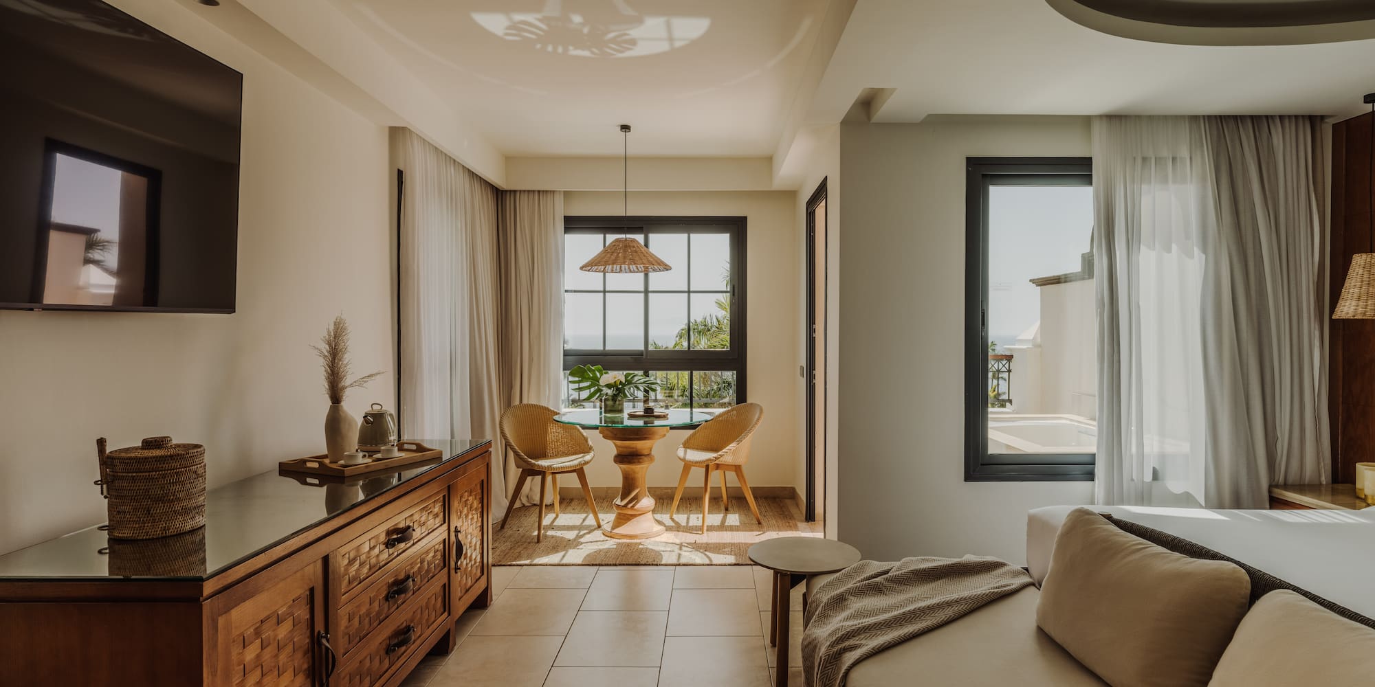 a living room with a tv and a couch