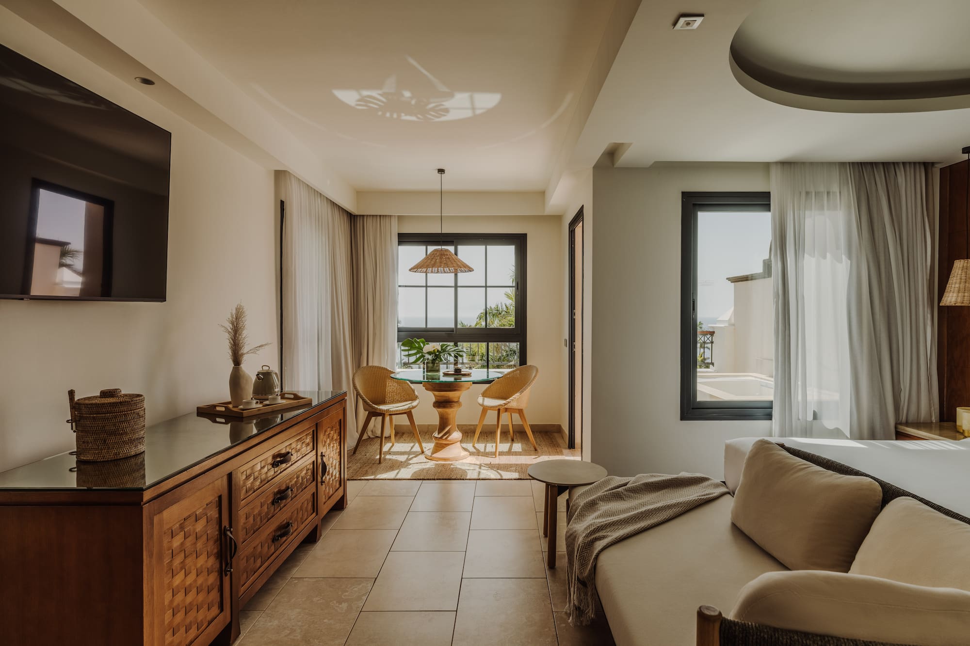 a living room with a tv and a couch