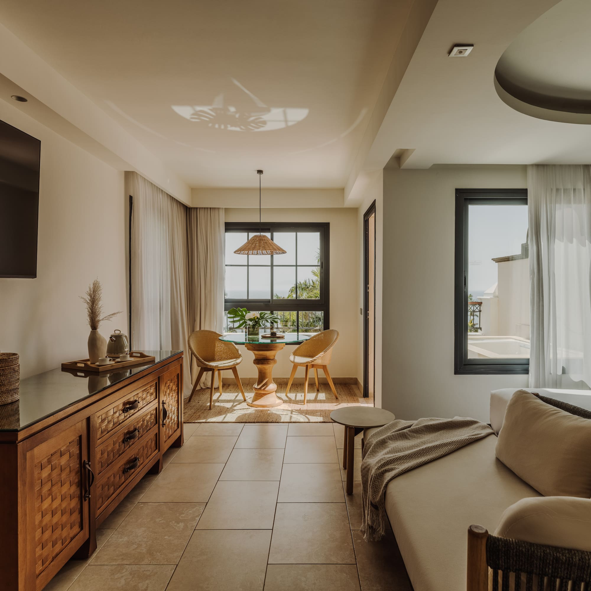a living room with a tv and a couch