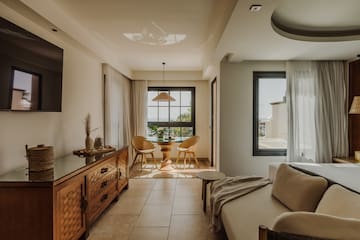 a living room with a tv and a couch