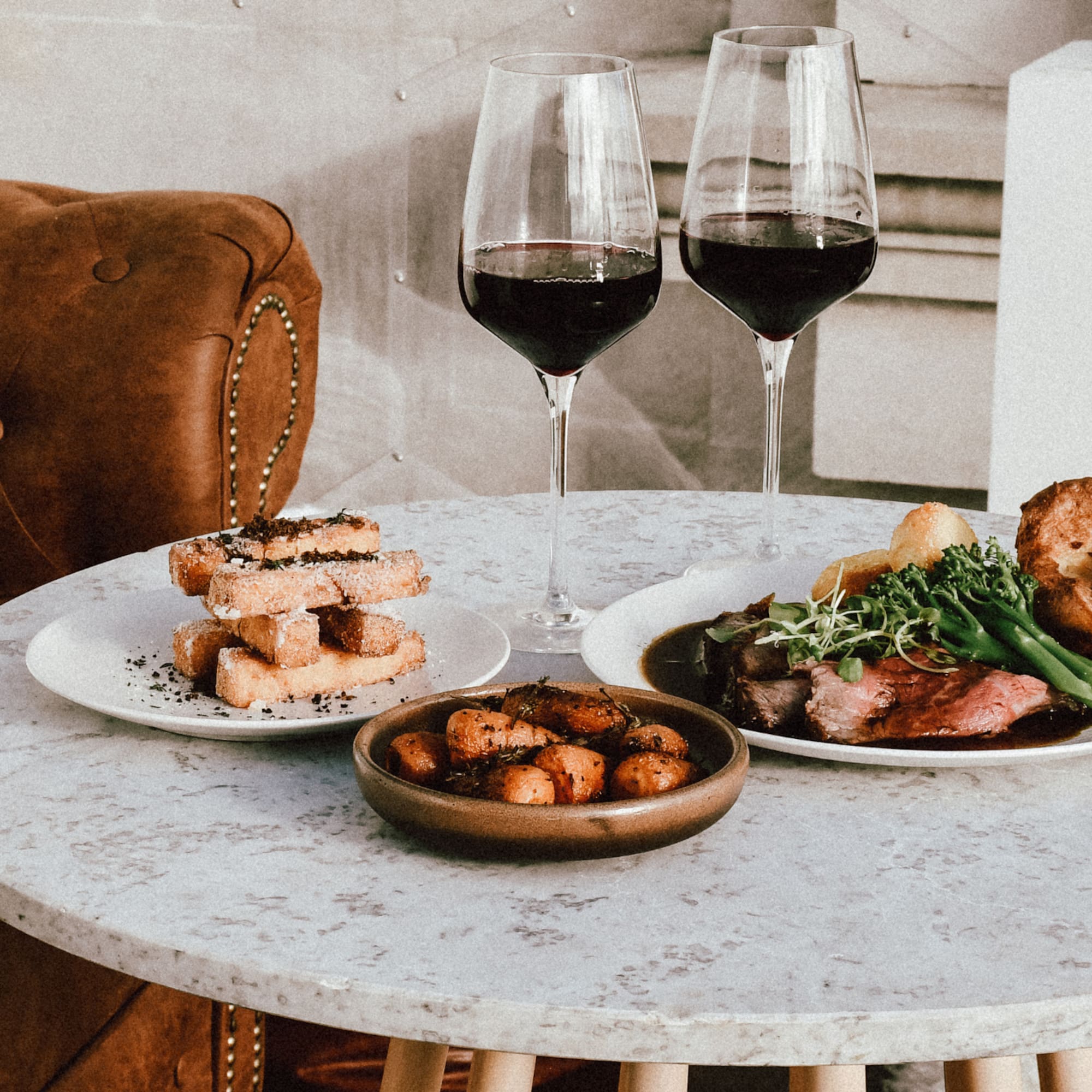 a group of burgers on a shelf
