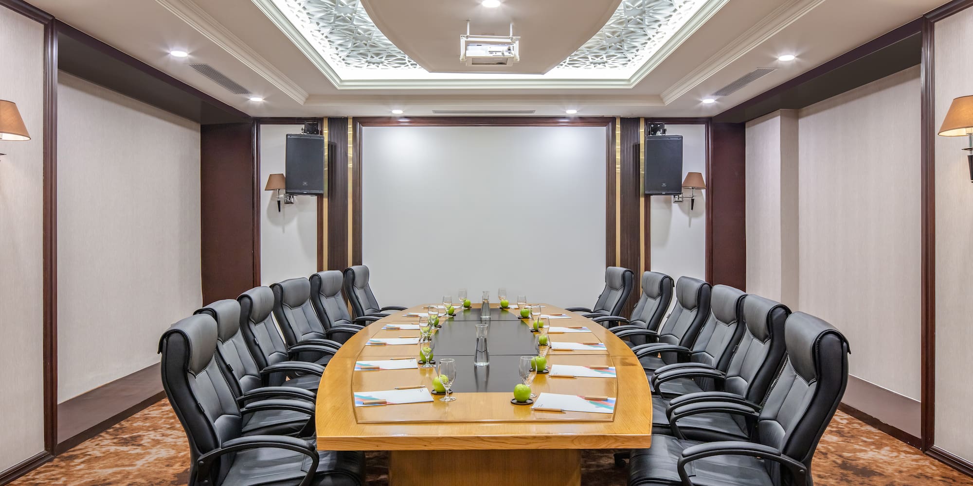 a conference room with chairs and a table