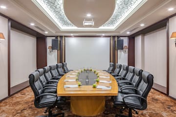 a conference room with chairs and a table