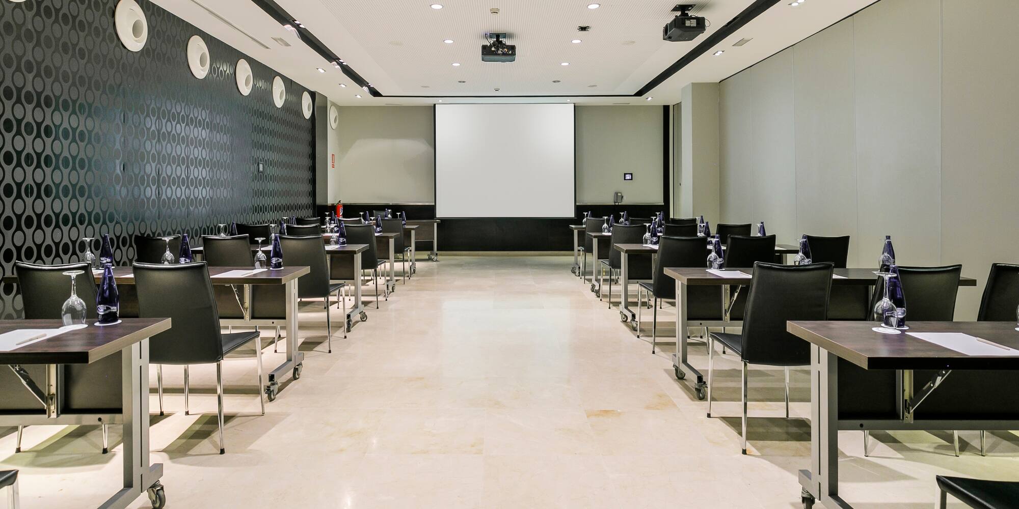 a room with tables and chairs