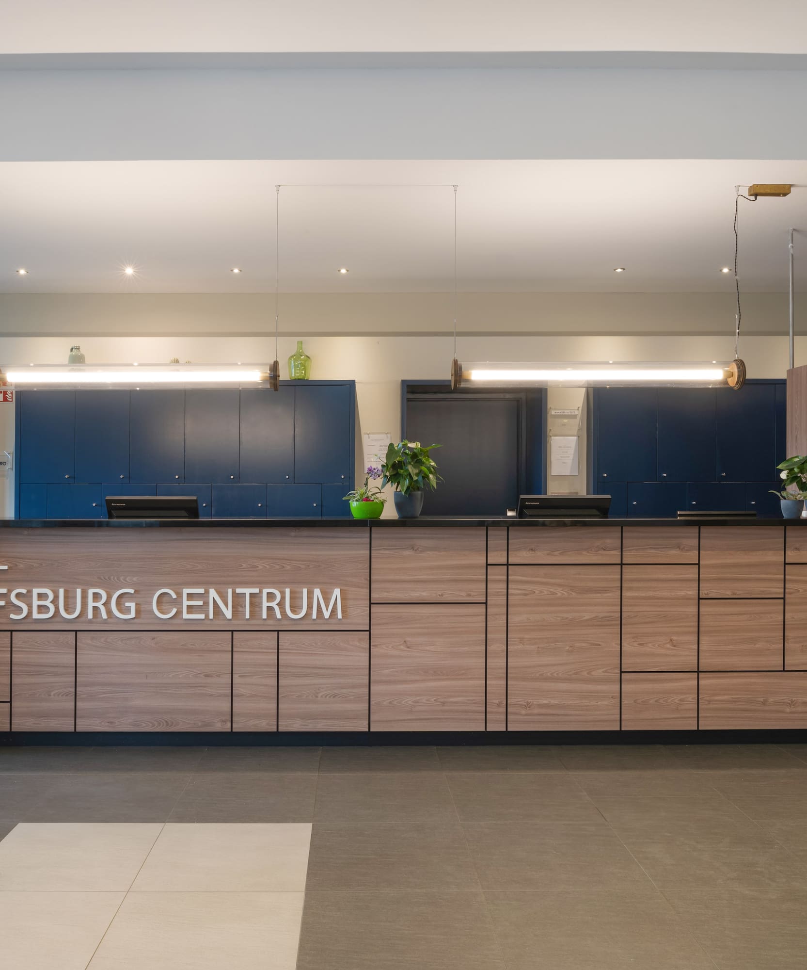 a reception desk in a hotel