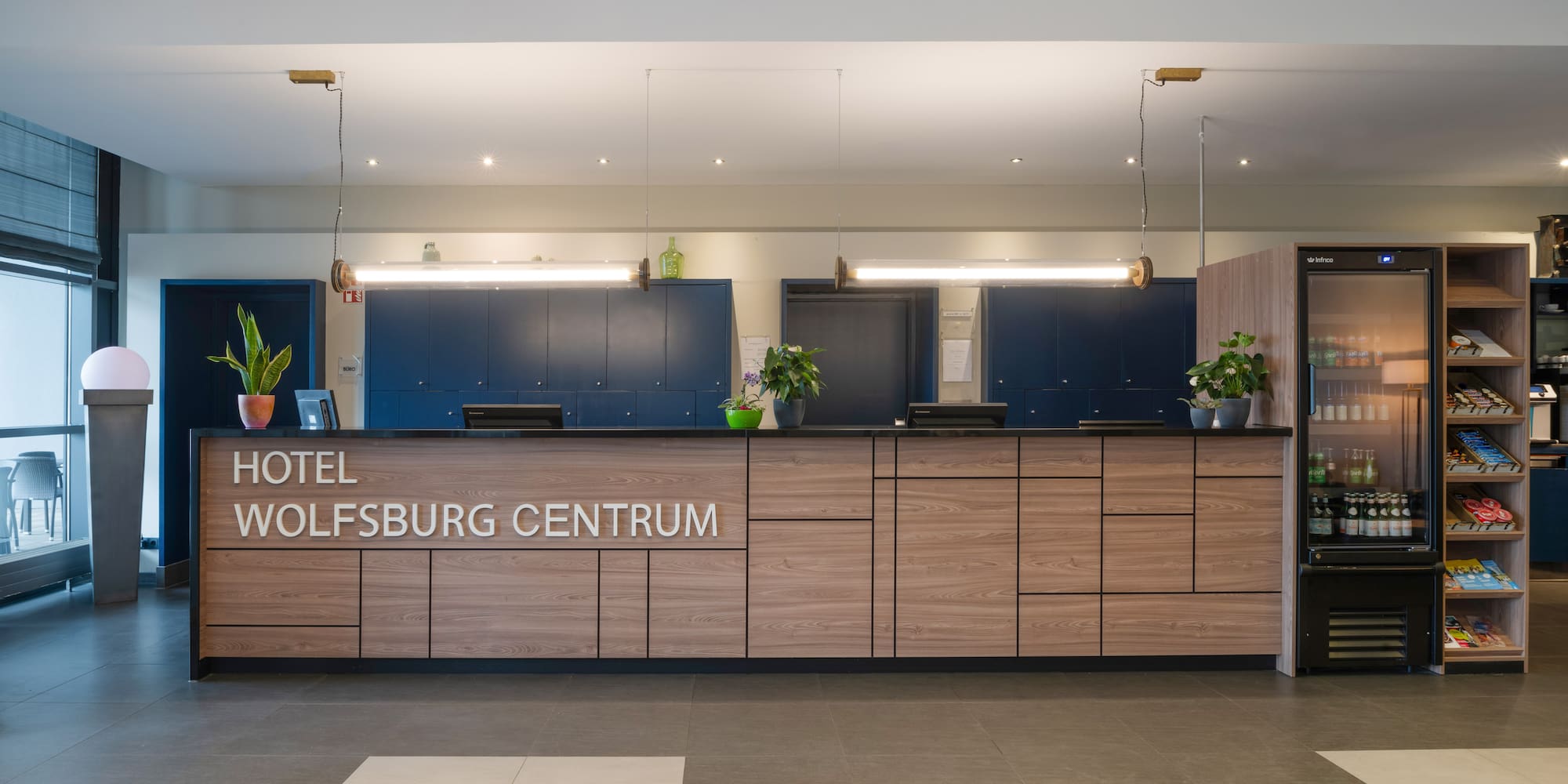 a reception desk in a hotel