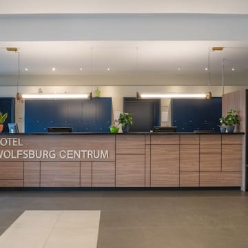 a reception desk in a hotel
