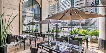 a restaurant with tables and chairs