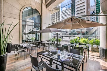 a restaurant with tables and chairs