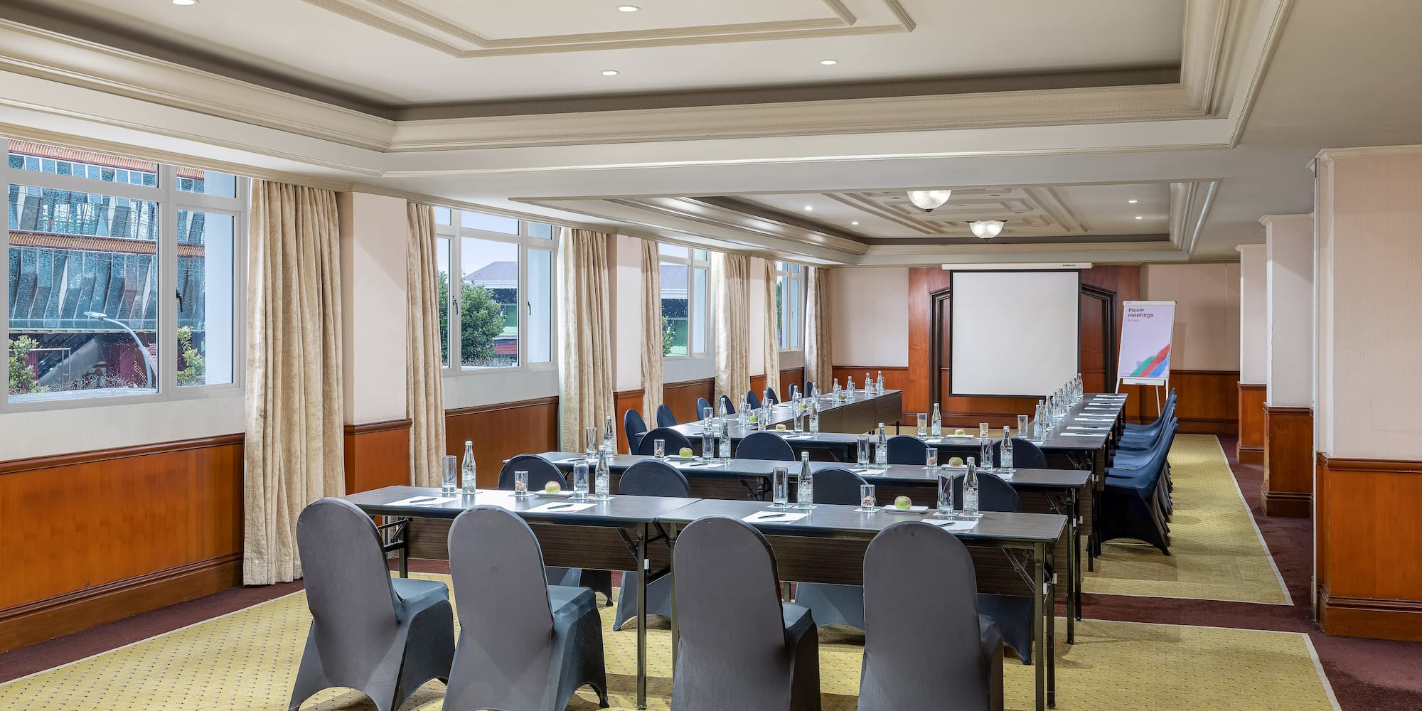 a room with tables and chairs