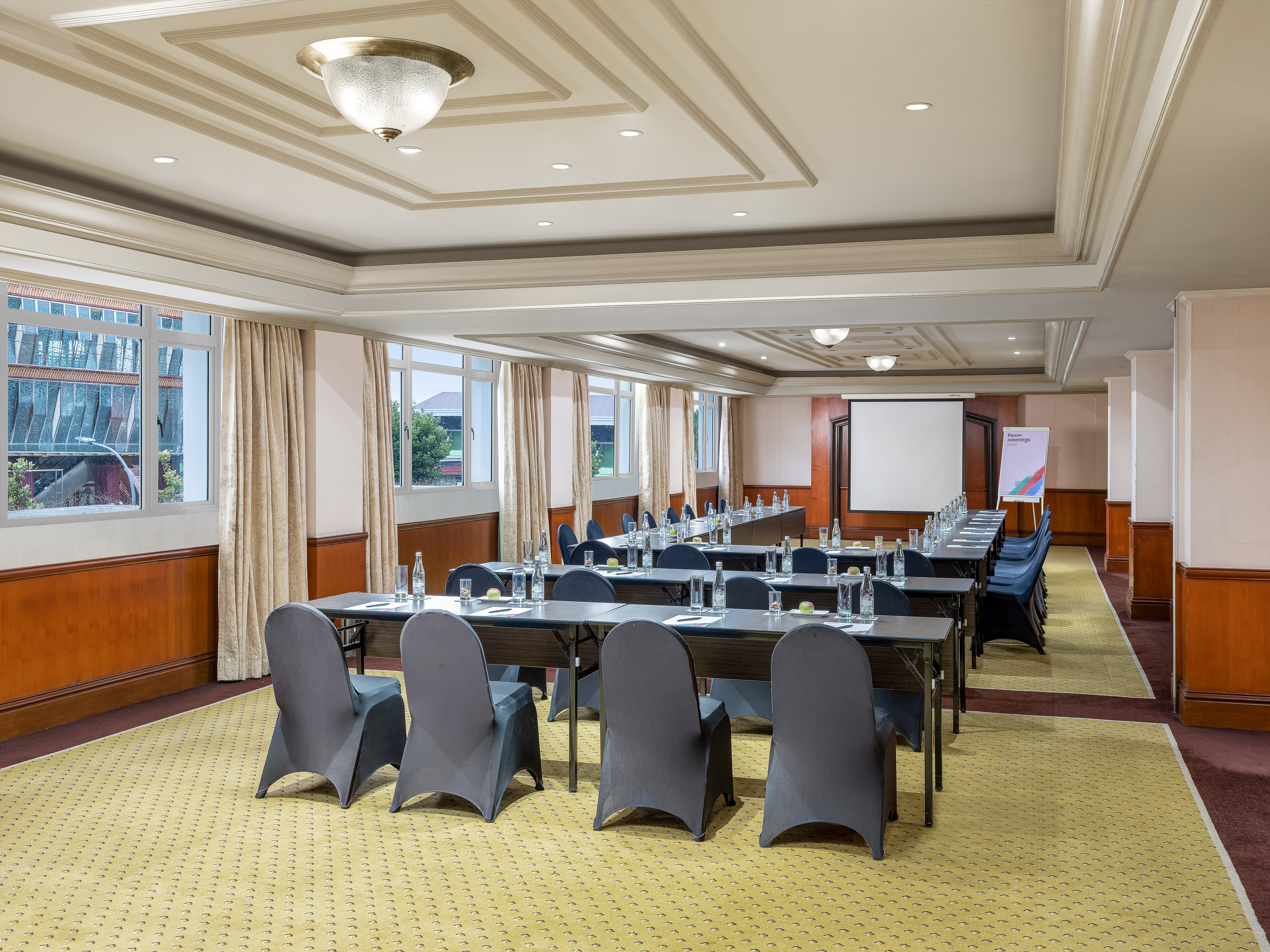 a room with tables and chairs