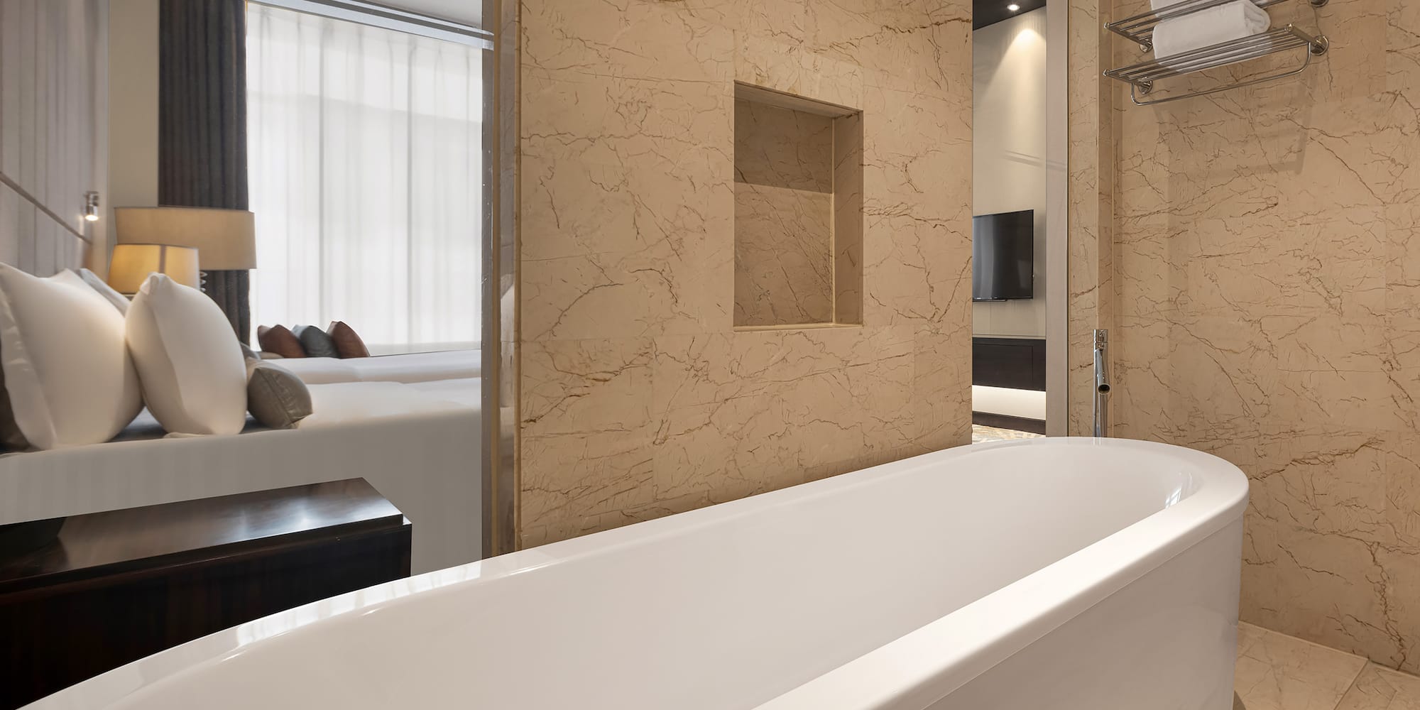 a bathroom with a bathtub and a mirror